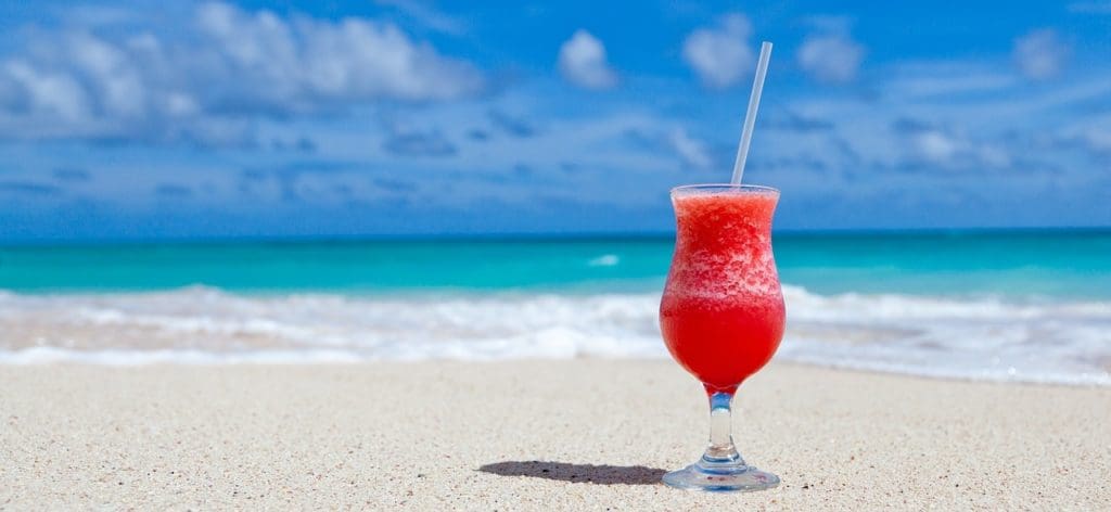 Cocktail on the beach, saving time and money with eCoaching
